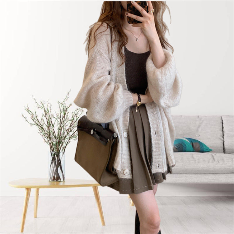 Damen gemütliche Strickjacke mit voluminösen Ärmeln EB