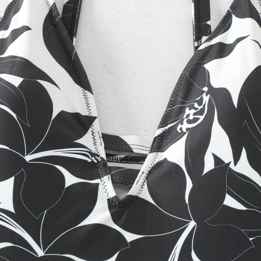 Damen Einteiler Badeanzug mit elegantem floralem Design und modernem V-Ausschnitt EB