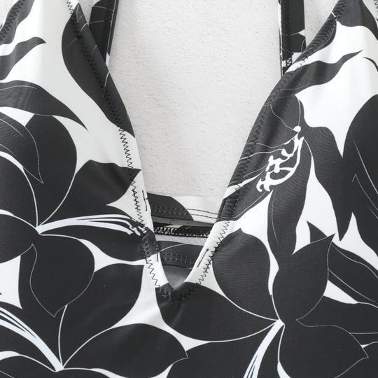 Damen Einteiler Badeanzug mit elegantem floralem Design und modernem V-Ausschnitt EB