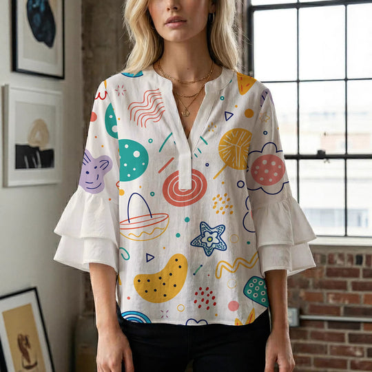 Damen Bluse mit voluminösen Rüschenärmeln und floralem Muster EB