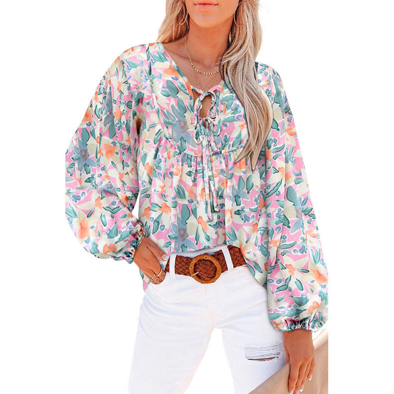 Damen Lockere Bluse mit floralem Muster und voluminösen Ärmeln EB