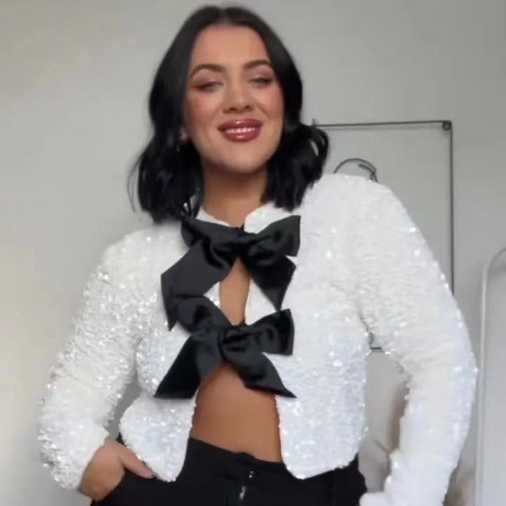 Damen Eleganter Paillettenblazer mit großem Schleifenverschluss und funkelnden Details EB