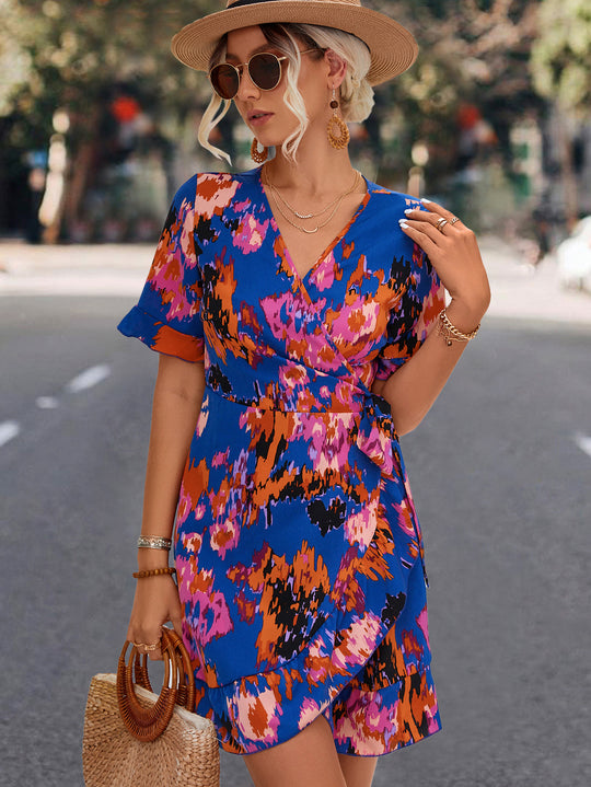 Damen Wickelkleid mit floralen Akzenten und elegantem Taillengurt EB