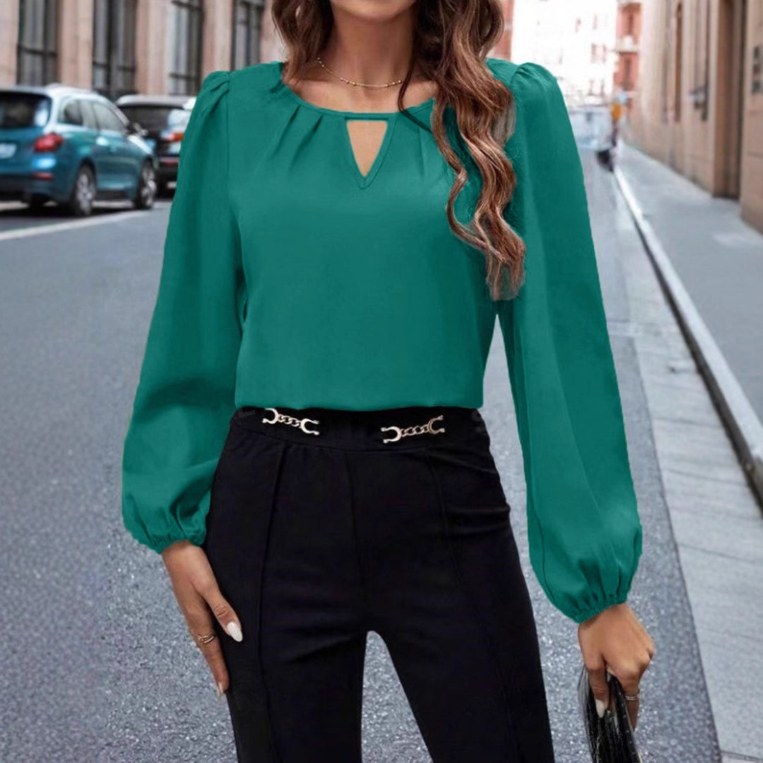 Damen elegante Bluse mit modischem Schlüsselausschnitt und raffinierten Puffärmeln EB