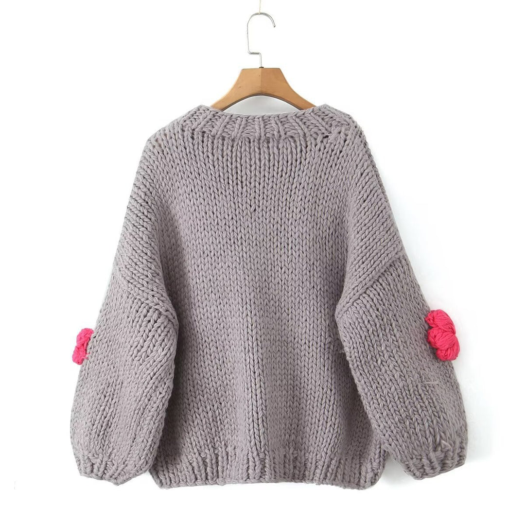 Damen gepunkteter Strickpullover mit voluminösen Ärmeln und floralem Design EB