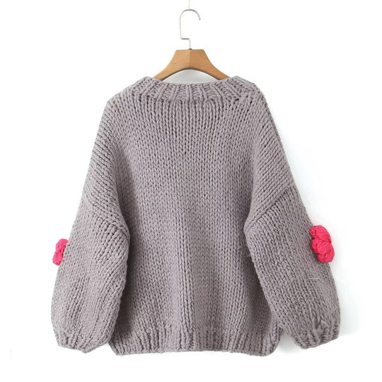Damen gepunkteter Strickpullover mit voluminösen Ärmeln und floralem Design EB