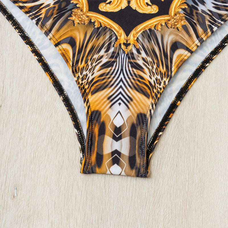 Damen Einteiler Badeanzug mit elegantem Tiermotiv und Rüschendetails EB