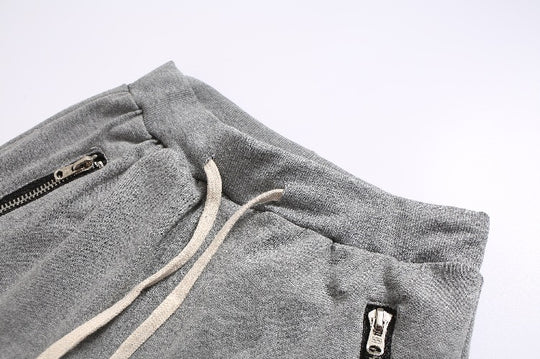 Herren Sportliche Jogginghose im modernen Design mit seitlichen Reißverschlüssen EB