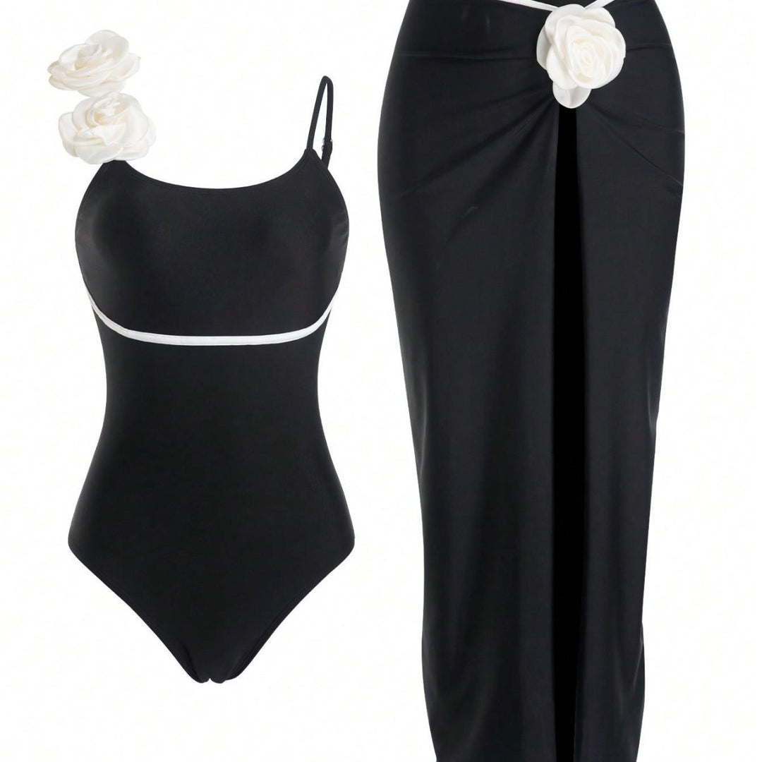 Damen Einteiler Badeanzug mit elegantem Rock und verspielten Blütendetails EB