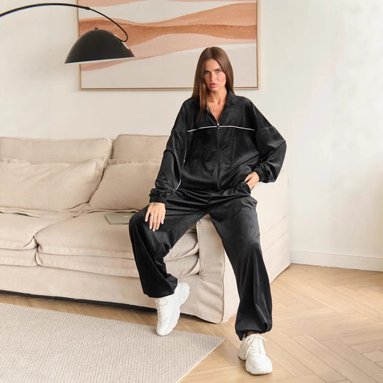Damen Palazzo-Lounge-Set aus seidig-weichem Nicki mit hoher Kragenblende, Oversize-Passform und elastischer Bundhose Eichborn Berlin