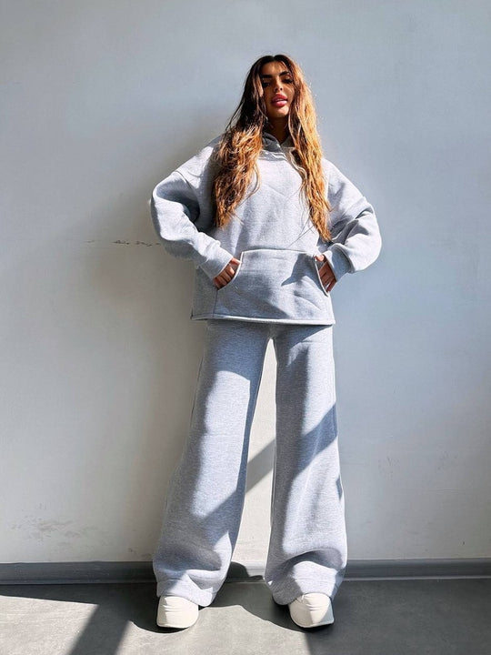 Damen Scuba-Fleece Lounge-Set mit Oversize-Kapuzenpullover und weiter Flare-Hose Eichborn Berlin
