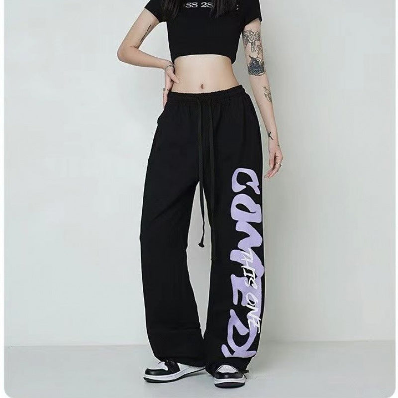 Damen nan weite Lounge-Hose mit elastischem Bund, Kordelzug und markantem Seitengrafikprint EB