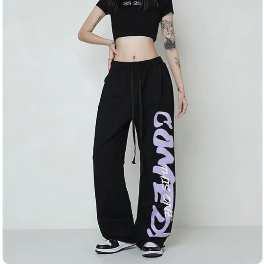 Damen nan weite Lounge-Hose mit elastischem Bund, Kordelzug und markantem Seitengrafikprint EB