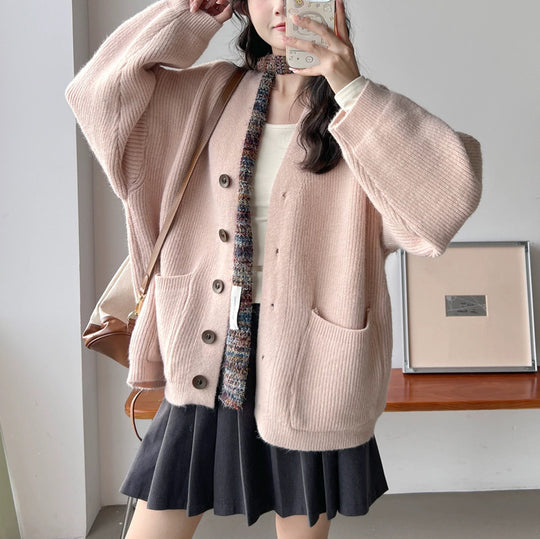 Damen Gemütliche Strickjacke mit großen Taschen und Knopfdetail EB