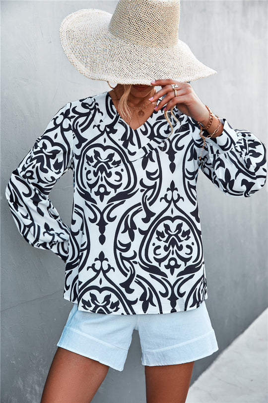 Damen Bluse mit elegantem Barockmuster und lässigen Puffärmeln EB