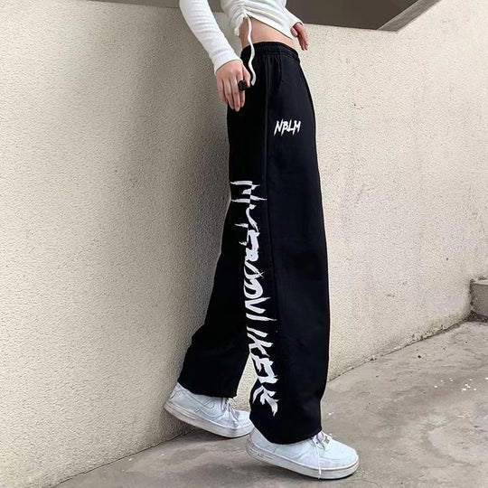 Damen nan locker geschnittene Wide‑Leg Jogginghose mit hohem Bund und markantem Seitenschriftzug EB