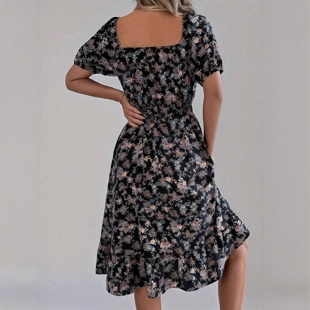 Damen sommerliches Blumenkleid mit Puffärmeln und Rüschensaum EB