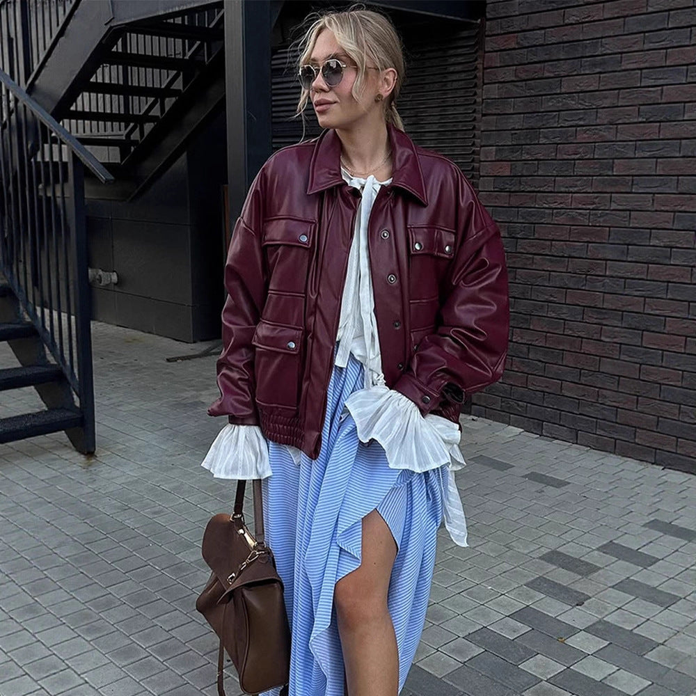 Damen oversized Kunstlederjacke mit funktionalen Taschen und elastischem Bund EB