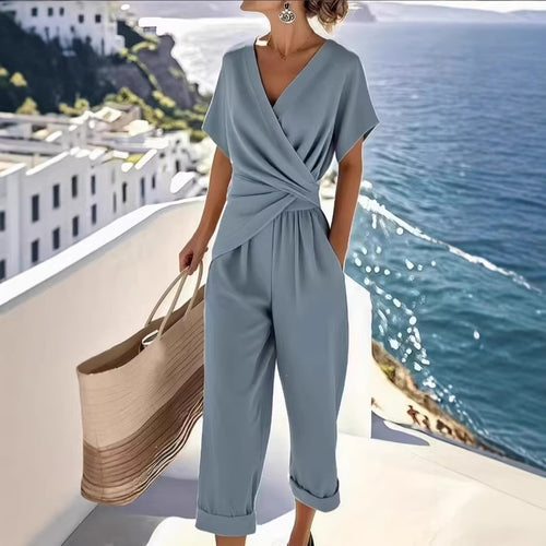 Damen Eleganter Jumpsuit mit Wickeloptik und breiten Beinen EB