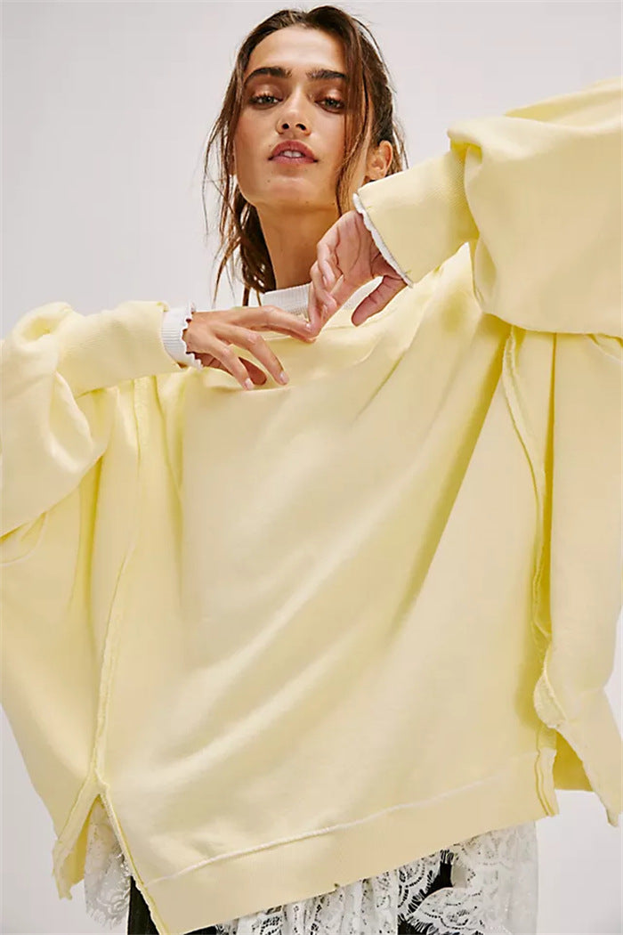 Damen oversized Sweatshirt mit Ballonärmeln, offenen Saumnähten und seitlichen Schlitzen Eichborn Berlin