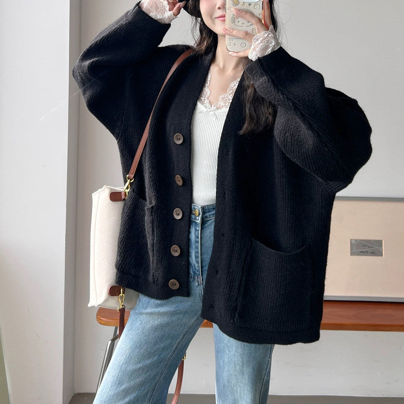 Damen Gemütliche Strickjacke mit großen Taschen und Knopfdetail EB