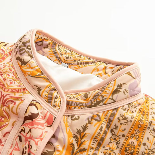 Damen gesteppte Übergangsjacke mit floralem Muster und praktischen Taschen EB
