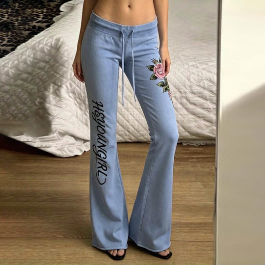 Damen nan ausgestellte Jersey-Sweathose mit Kordelzug, floralem Seitenprint und Statement-Schriftzug EB