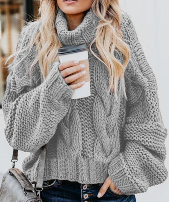 Damen Grobstrickpullover mit hohem Kragen und Zopfmuster EB