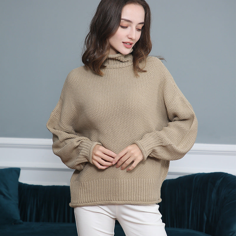 Damen Grobstrickpullover mit Rollkragen und luftiger Schnittgestaltung EB