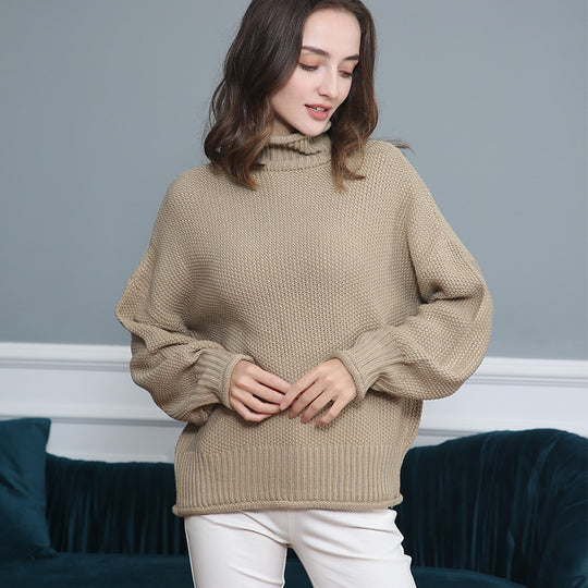 Damen Grobstrickpullover mit Rollkragen und luftiger Schnittgestaltung EB