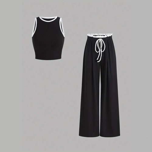 Damen stylishes Sport-Set mit hoch taillierter Weitbein-Hose und sportlichem Bustier EB