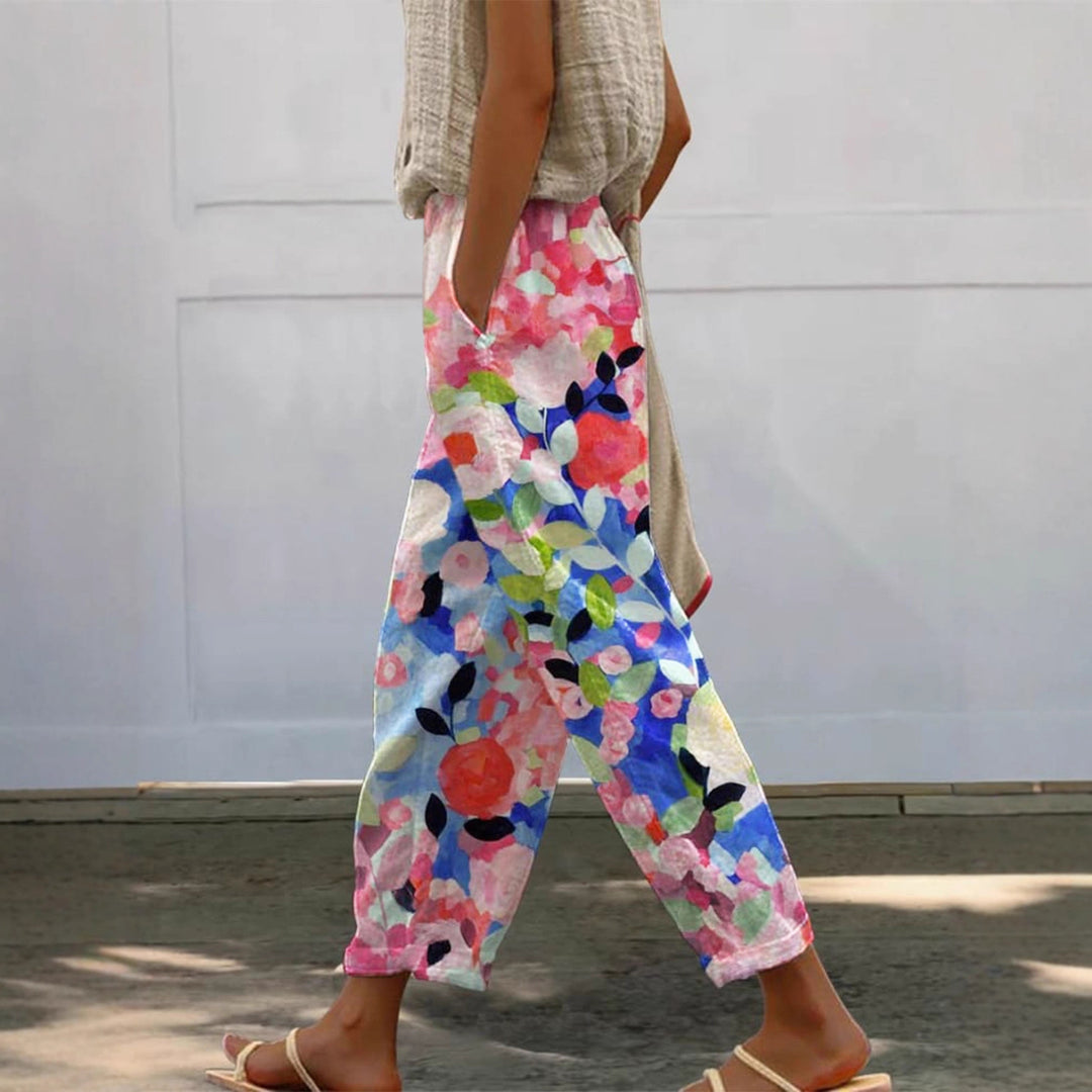 Damen Weite Sommerhose mit floralem Design und praktischen Taschen EB