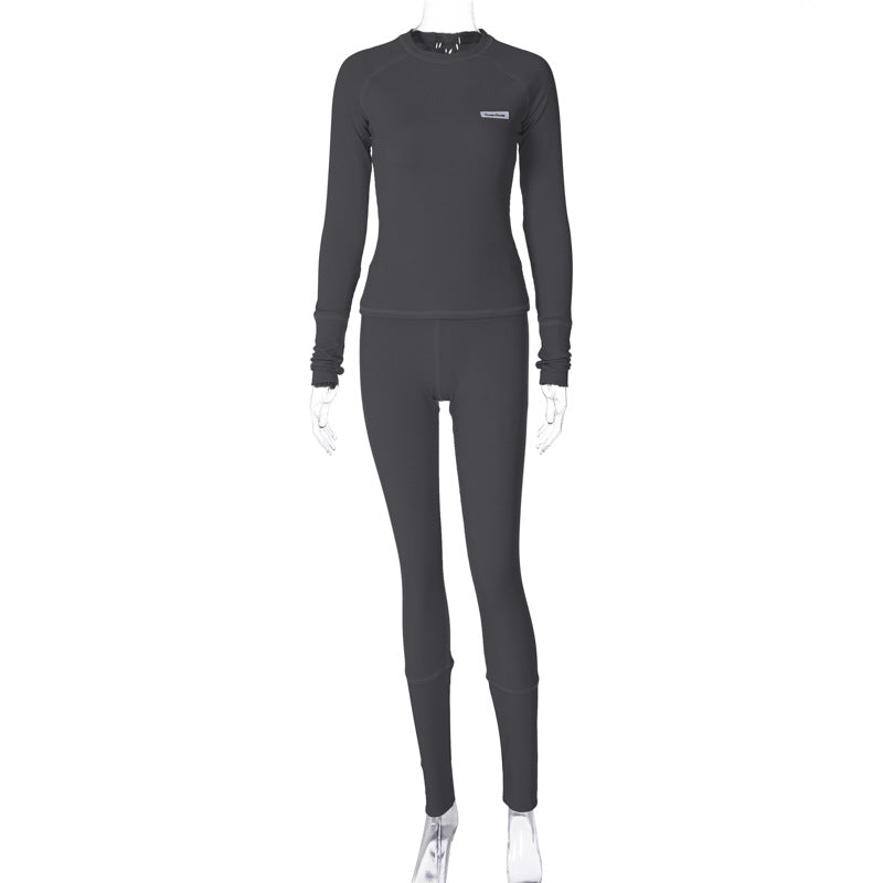Damen Sportliches Funktions-Set mit langärmligem Oberteil und enganliegender Hose EB