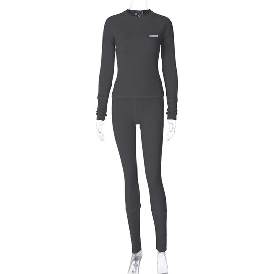 Damen Sportliches Funktions-Set mit langärmligem Oberteil und enganliegender Hose EB