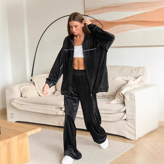 Damen Palazzo-Lounge-Set aus seidig-weichem Nicki mit hoher Kragenblende, Oversize-Passform und elastischer Bundhose Eichborn Berlin
