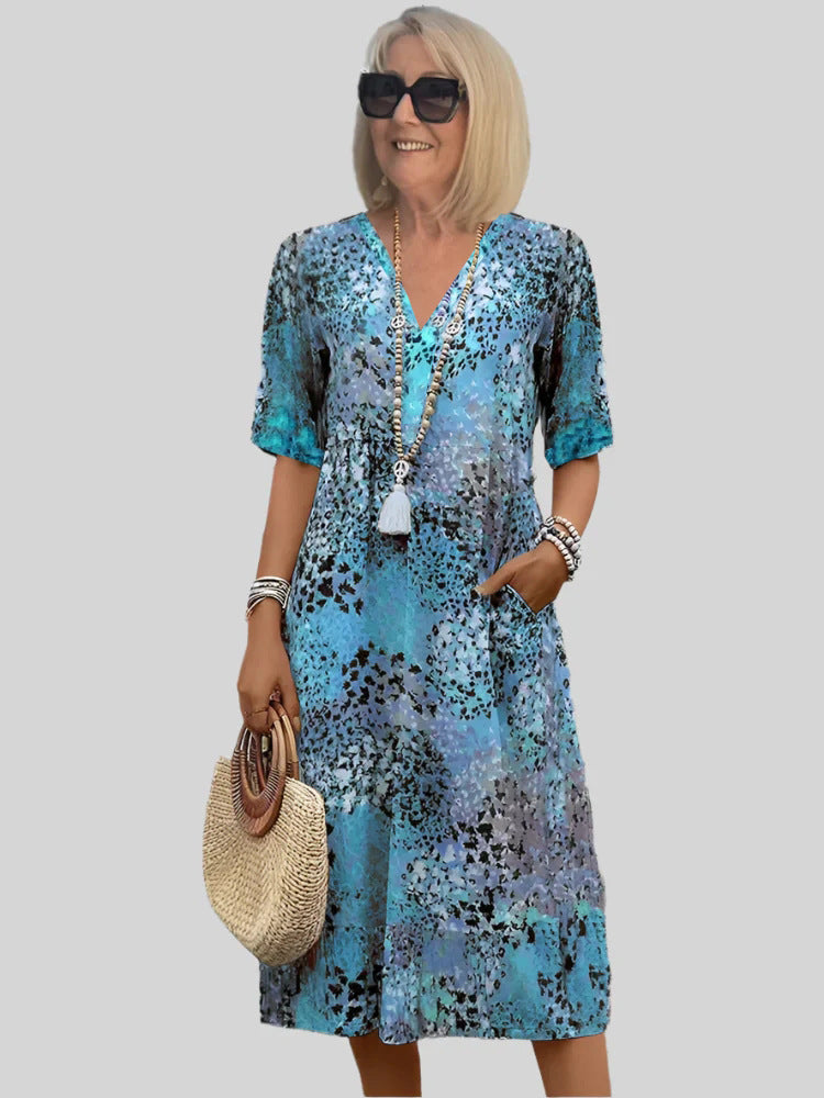 Damen Sommerliches Maxikleid mit floralem Design und praktischen Taschen EB