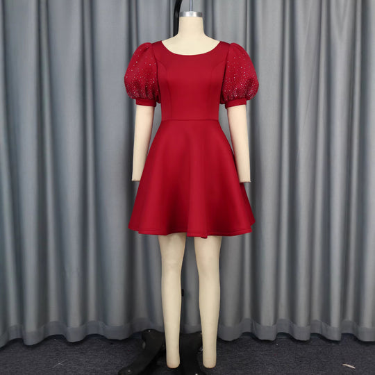 Damen A-Linien Kleid mit glamourösen Puffärmeln und Perlenapplikationen EB