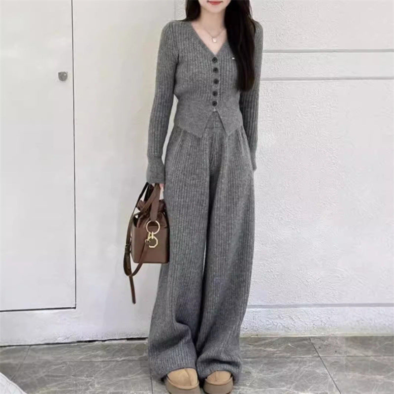 Damen Elegantes gestricktes Jumpsuit mit Knopfdetails und weitem Bein EB