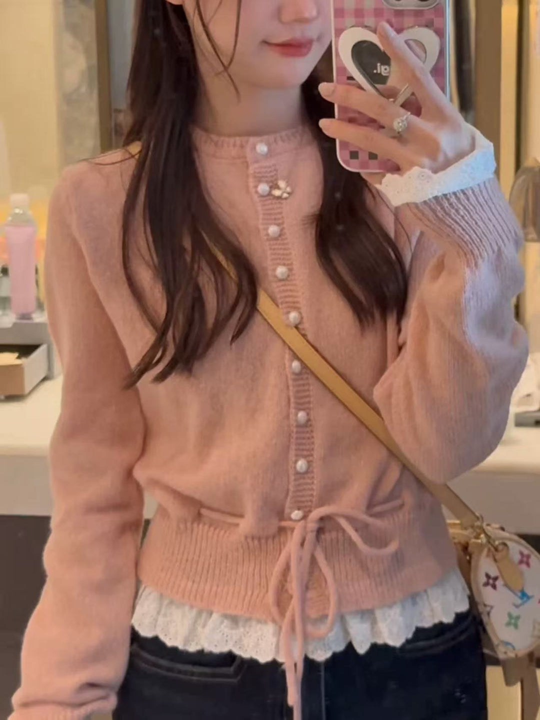 Damen kuscheliger Strickjacke mit fransigen Details und Bändchen EB