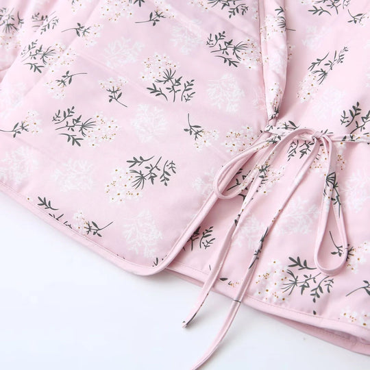 Damen gesteppte Übergangsjacke mit floralem Muster und kontrastierenden Details EB
