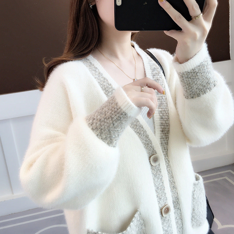 Damen Strickjacke mit modernem Farbkontrast und großen Taschen EB