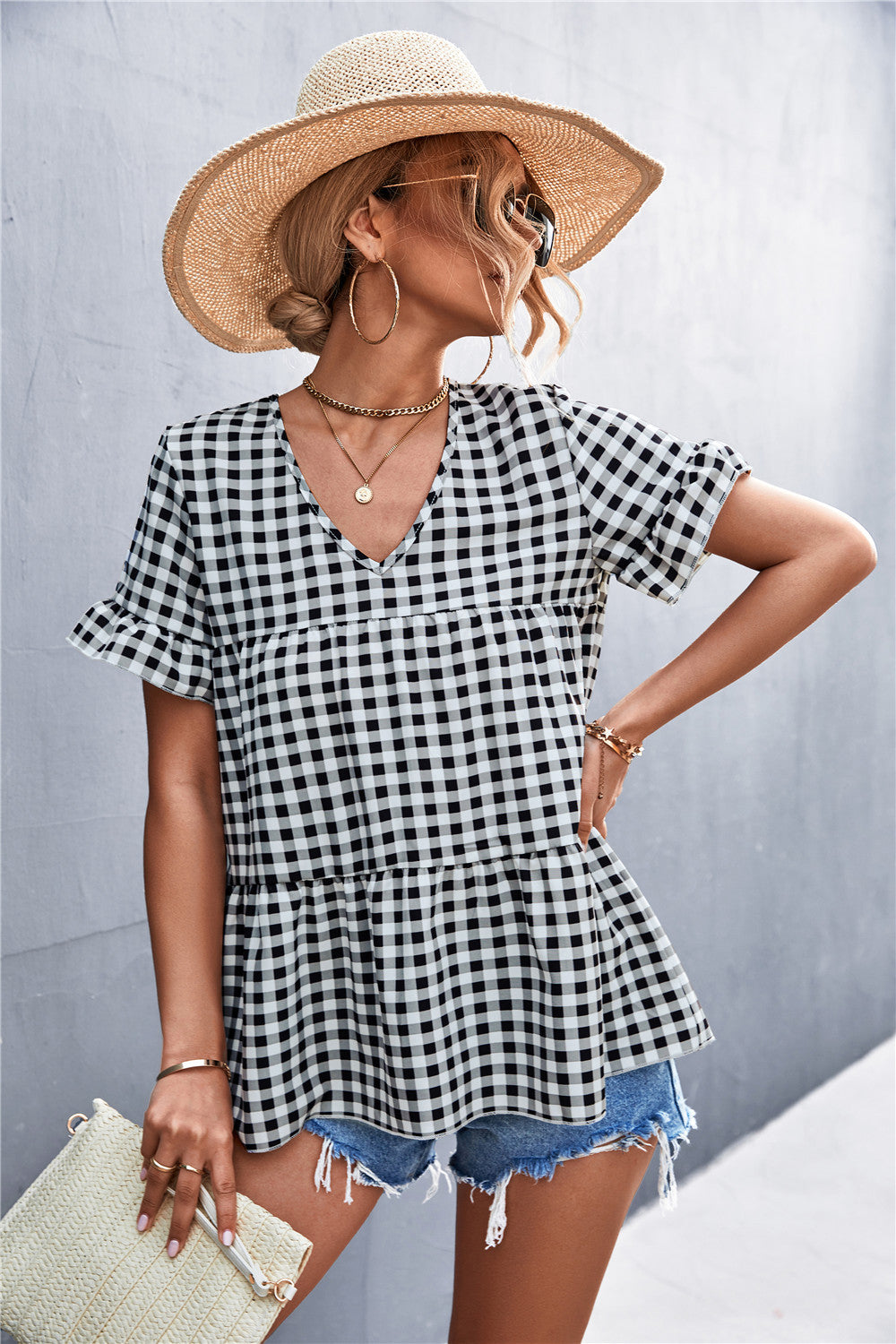 Damen Blusenshirt mit rüschenförmigem Saum und Karomuster EB