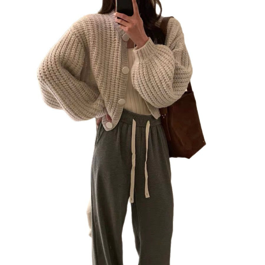 Damen Grobstrickcardigan mit voluminösen Ärmeln und großen Knöpfen EB