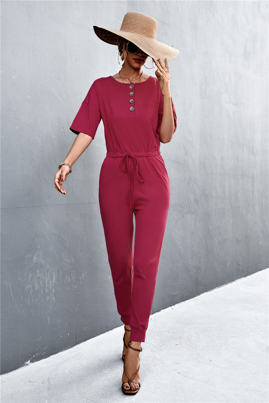 Damen Jumpsuit mit elegantem V-Ausschnitt und praktischen Taschen EB