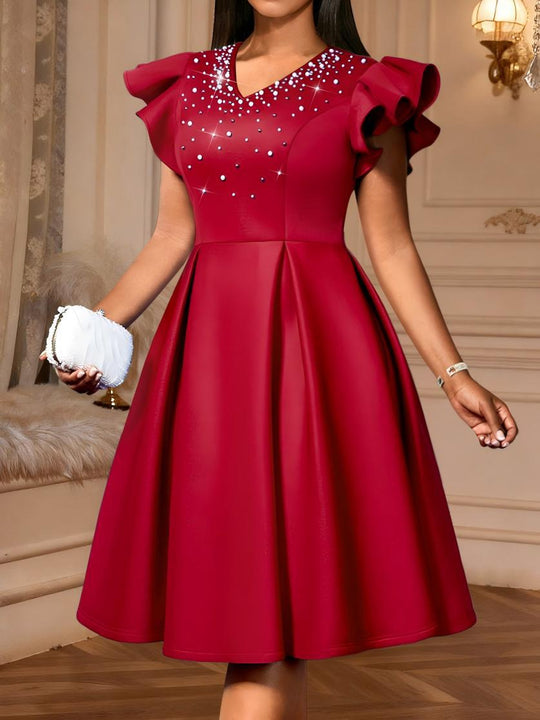 Damen A-Linien Kleid mit glitzernden Perlen und voluminösen Ärmeln EB