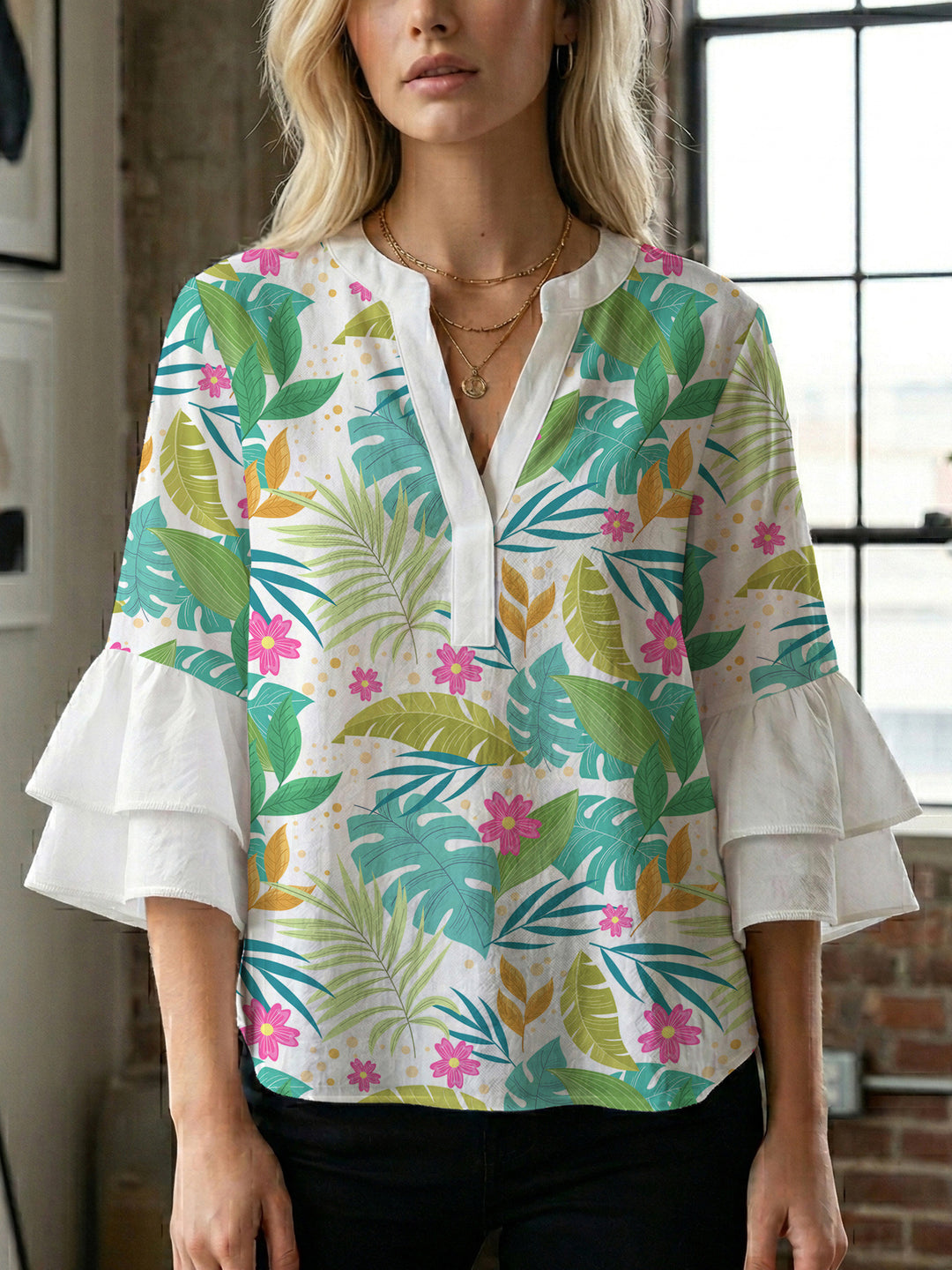 Damen Bluse mit voluminösen Rüschenärmeln und modernem Motiv EB