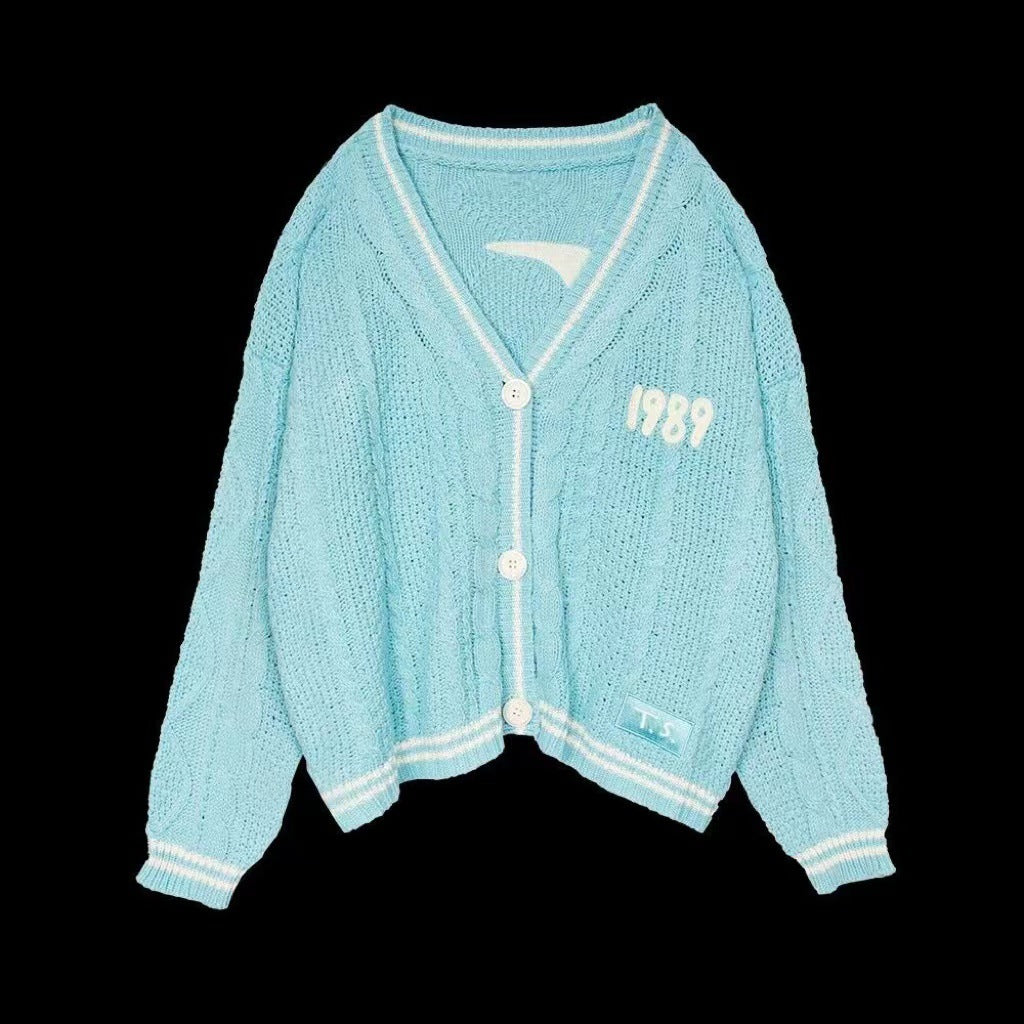 Damen nan kurz geschnittene Strickjacke mit V-Ausschnitt, Kontrastpaspel und oversized Ärmeln EB
