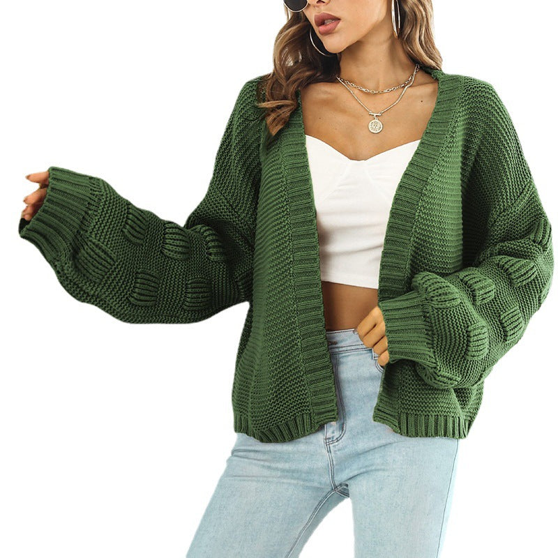 Damen Grobstrickjacke mit voluminösen Ärmeln und modernem Design EB