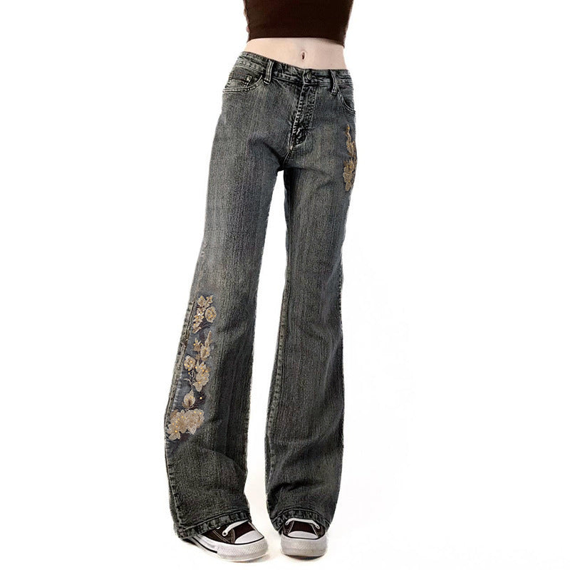 Damen Flared Jeans mit floralem Stickdesign EB
