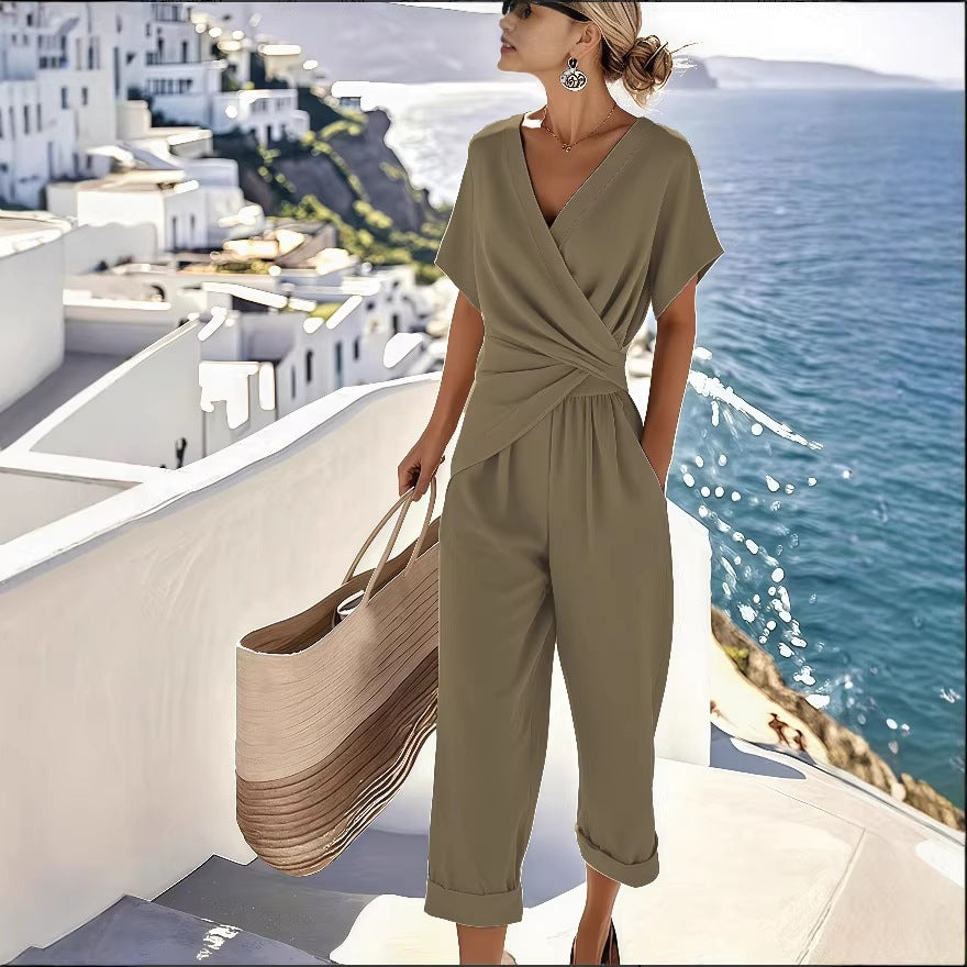 Damen Eleganter Jumpsuit mit Wickeloptik und breiten Beinen EB